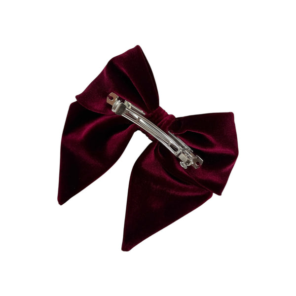 Crossed velvet bow